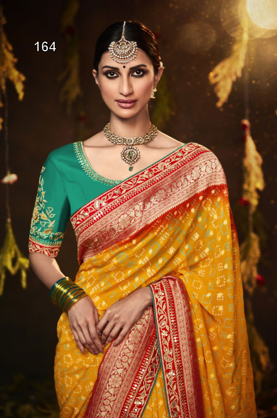 Bandhej Sindhuri By Kimora Heavy Wedding Bridal Saree Catalog